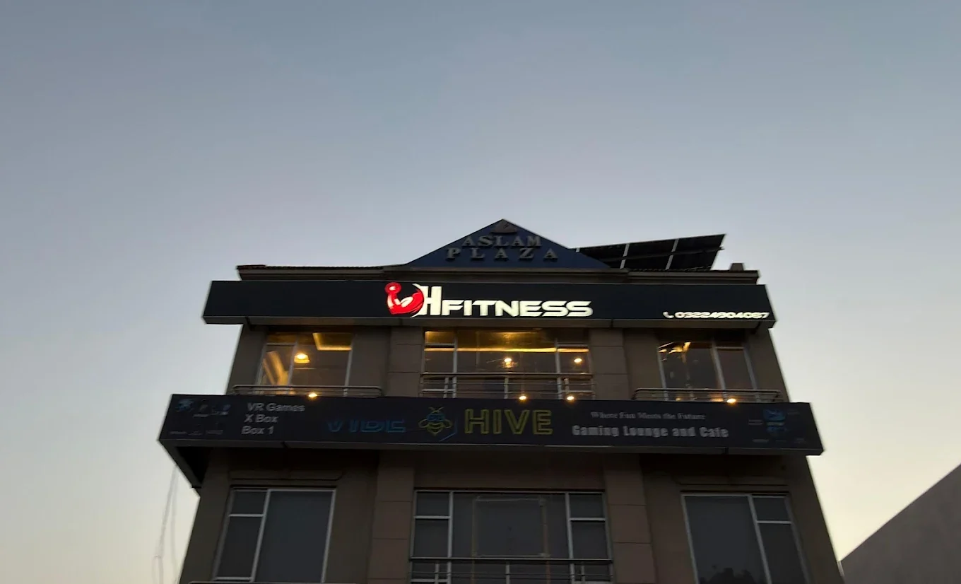 The H Fitness sign at Aslam Plaza