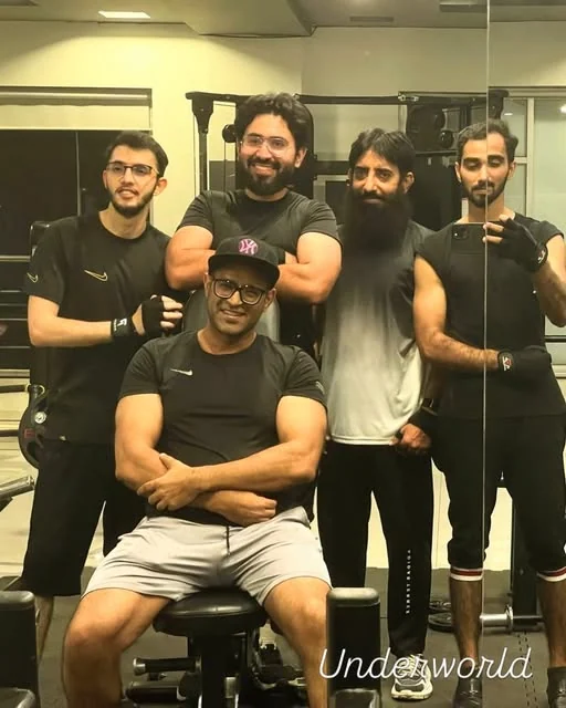 Hamza Ahmed with people at the gym